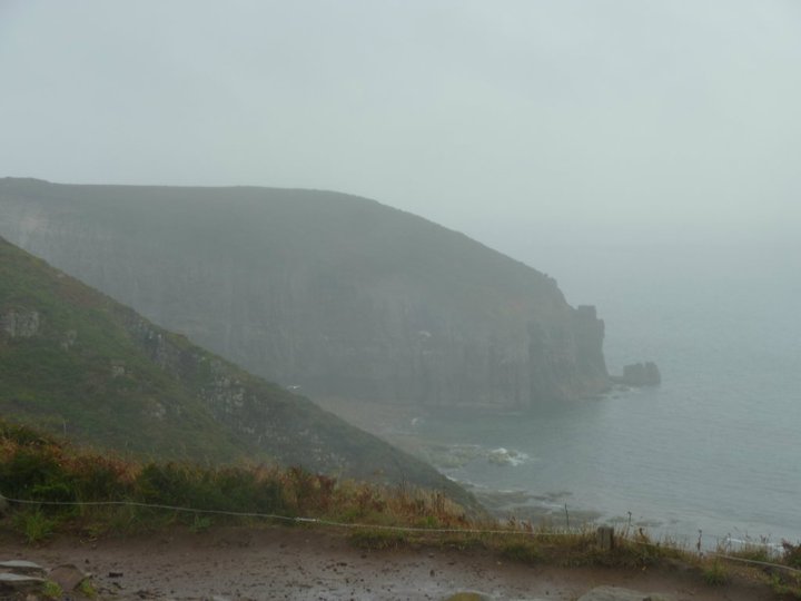 Misty rugged coastline in Brittany, France