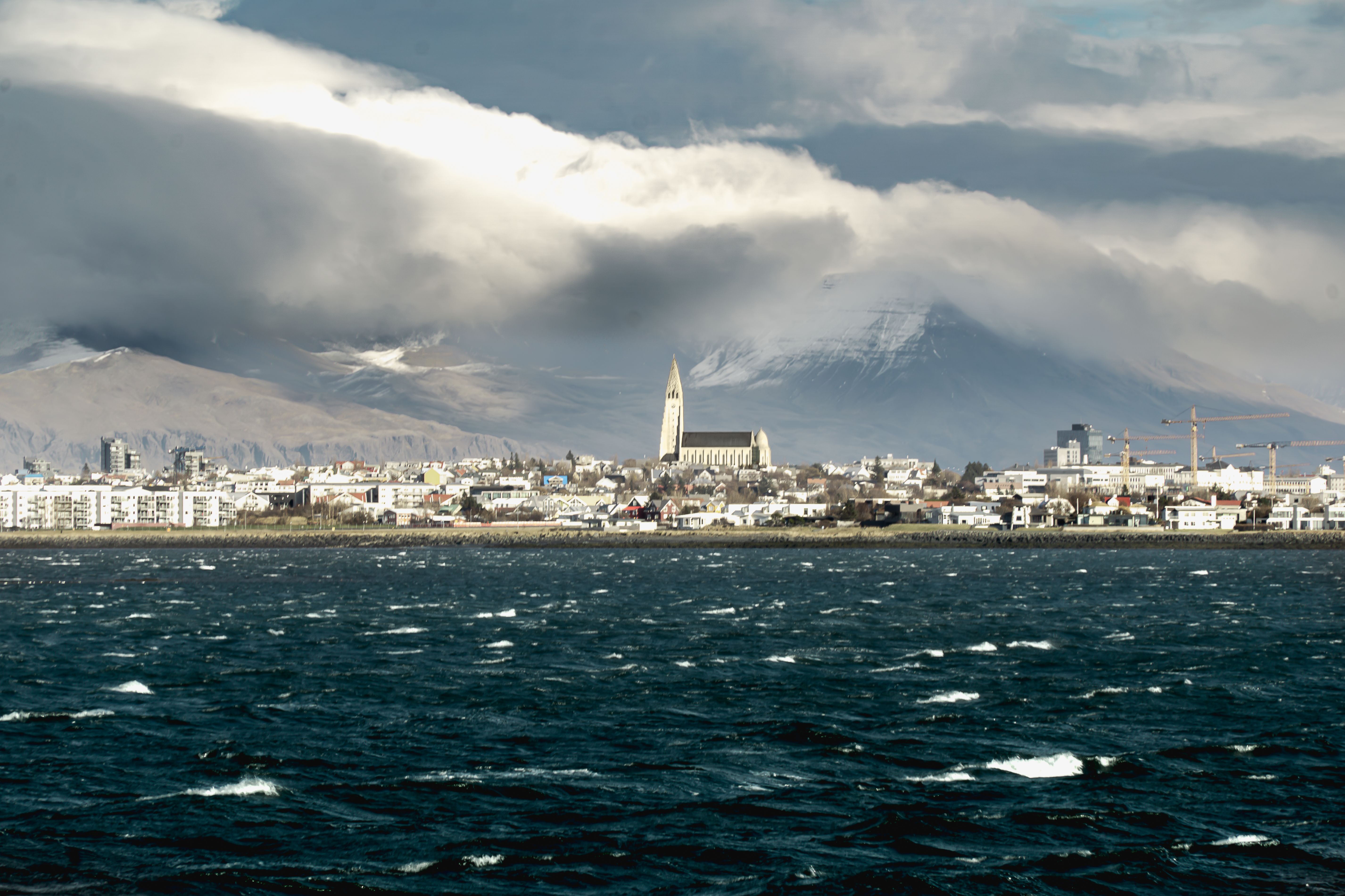 Icelandic coastline and mountains beneath dramatic clouds