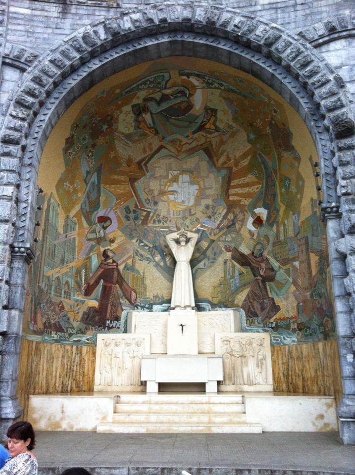 Altar and religious artwork at the Sanctuary in Lourdes