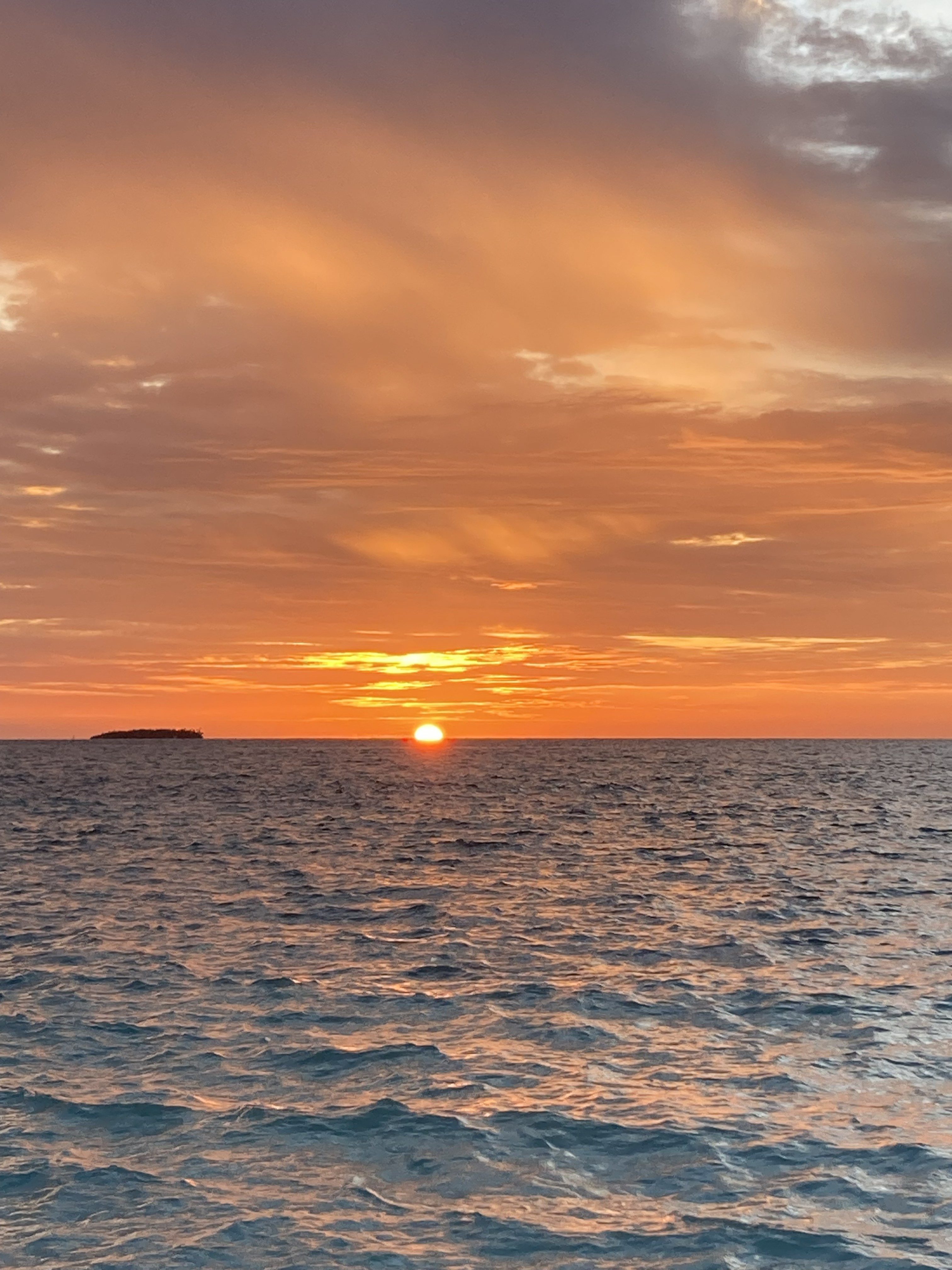 Golden sunset over Indian Ocean Maldives — Two for the Row'd
