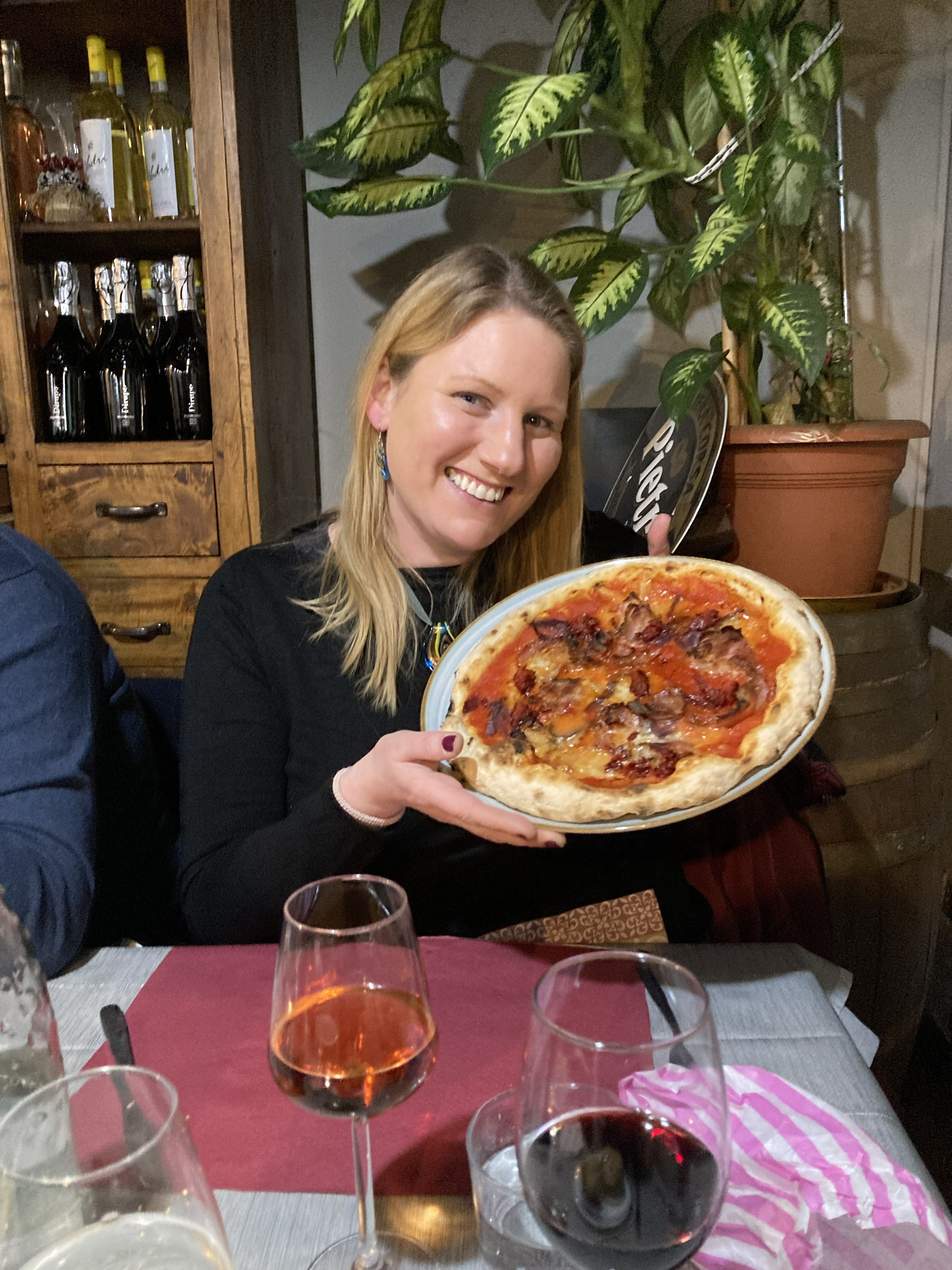 Nicola with pizza in Turin — Two for the Row'd