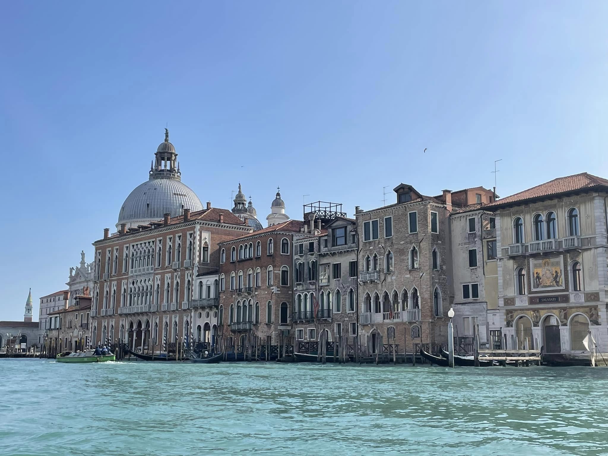 Historic Venetian waterfront viewed from the water