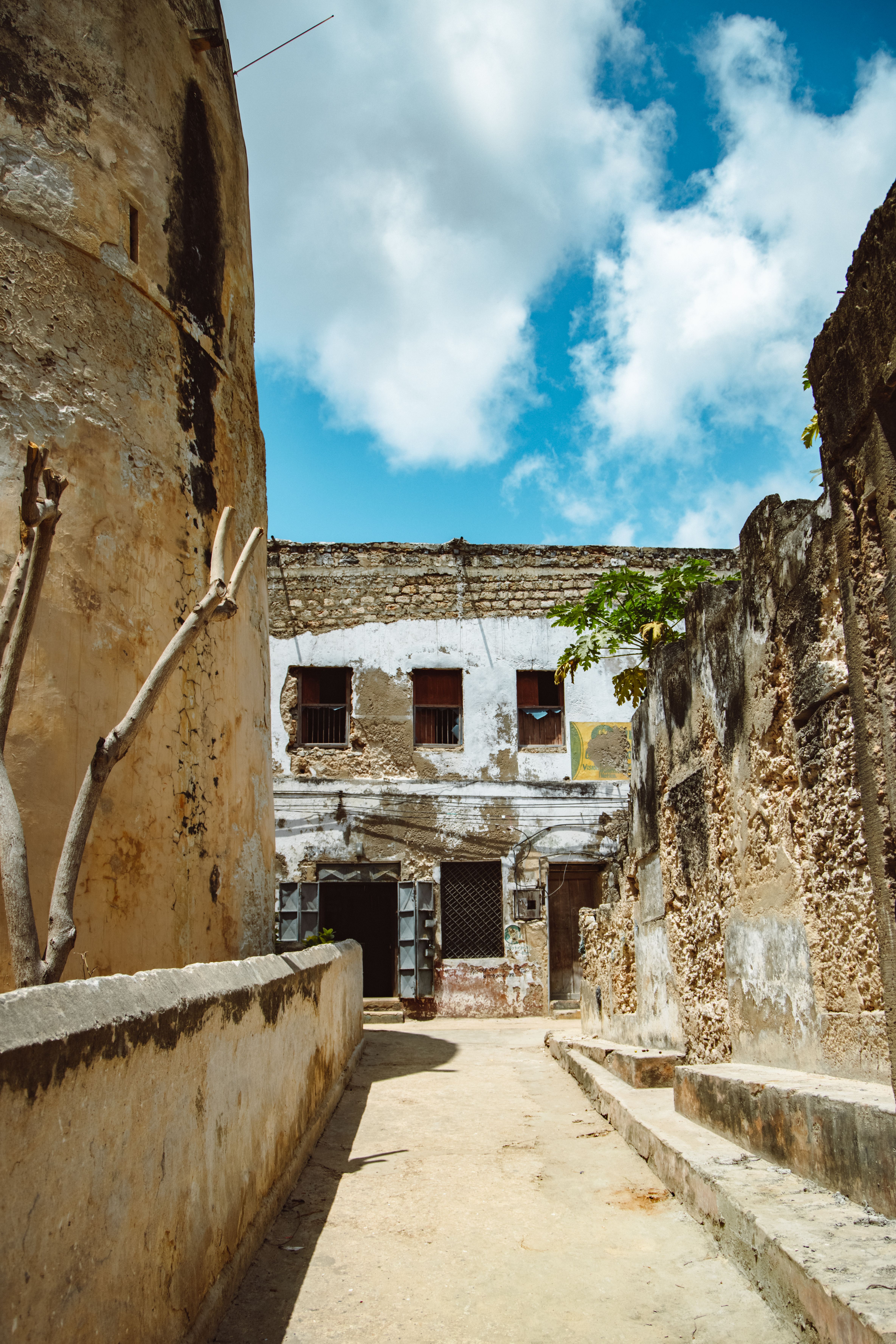 Narrow weathered street in historic Stone Town, Zanzibar