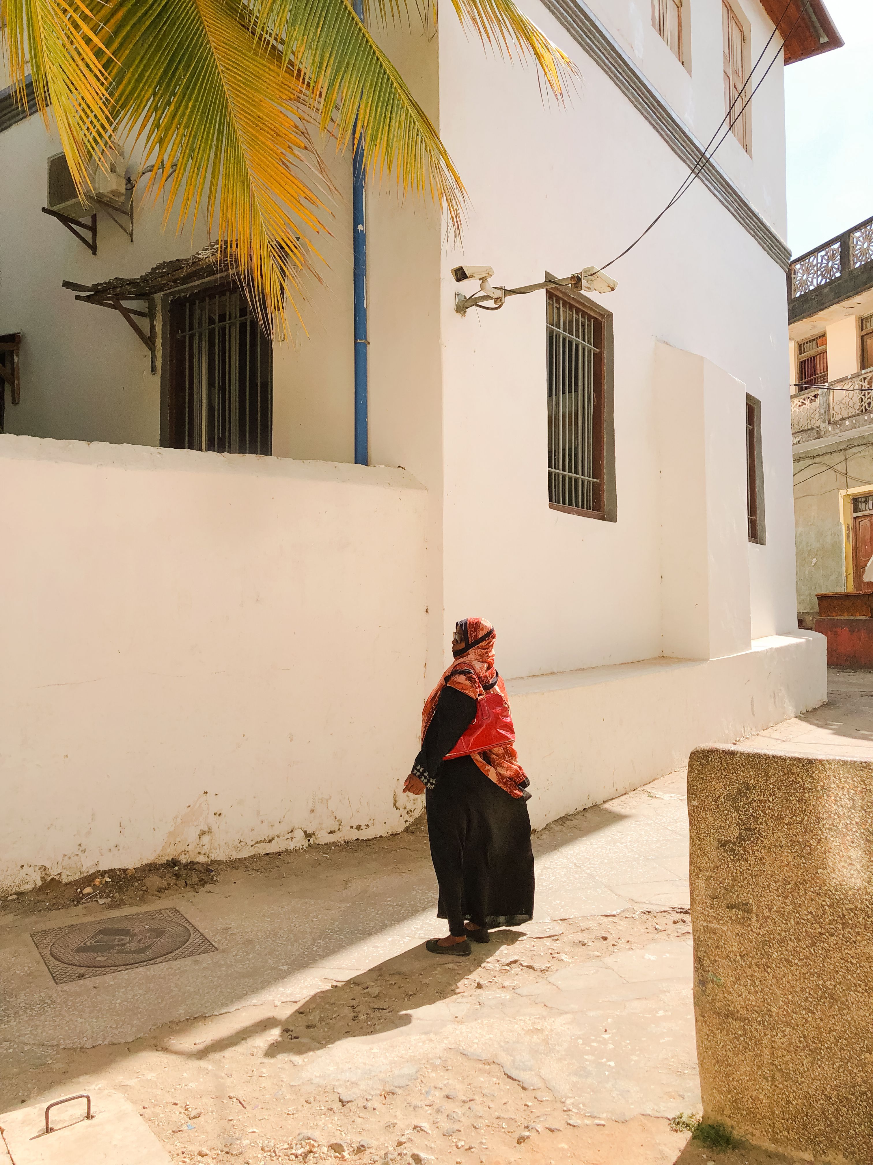Whitewashed Stone Town street scene in Zanzibar